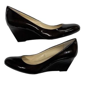 Calvin Klein Saxton brown / slightly reddish heel in the light. NWOT, NWOB